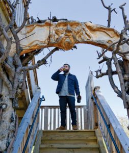 Ryan Burke standing on outdoor steps, at Angry Orchard.