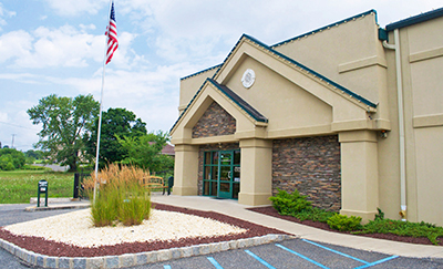 exterior shot of Highlands Storage building with flagpole