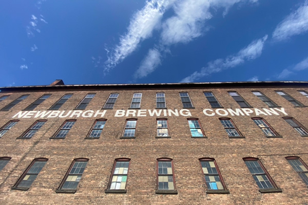 brick building with blue sky