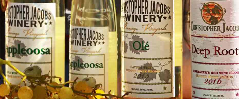 Lineup of 5 wine bottles from Christopher Jacobs Winery