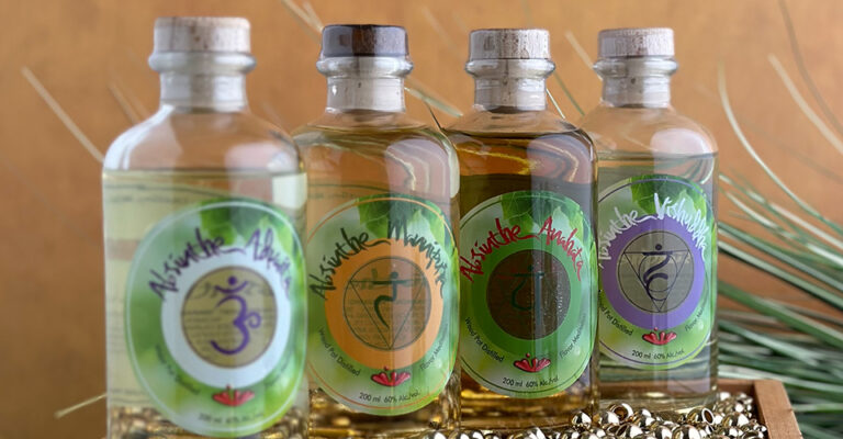 four bottles of absinthe in a row
