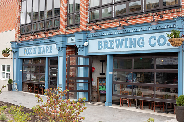 brick brewery building with blue trim
