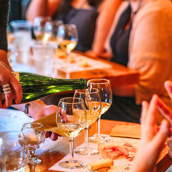 cider glasses and cheese samples at a cider pairing class