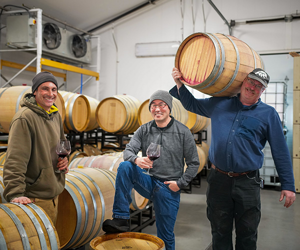 Winemakers in barrel room at Rolling Hills Estate Winery